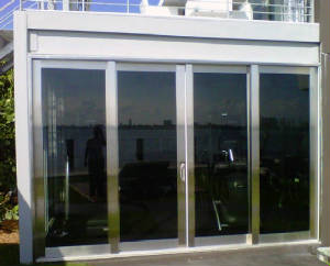 Impact Sliding Doors with Steel Cladding