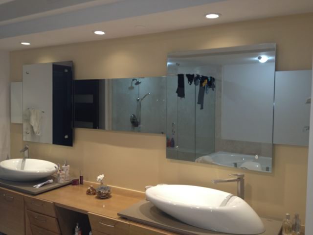 Double vanity mirror on stand-offs